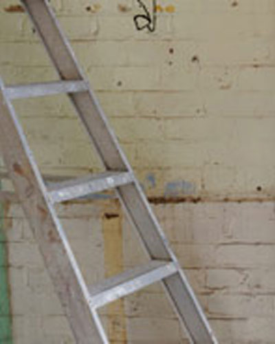 Ladder Leaning Against Wall